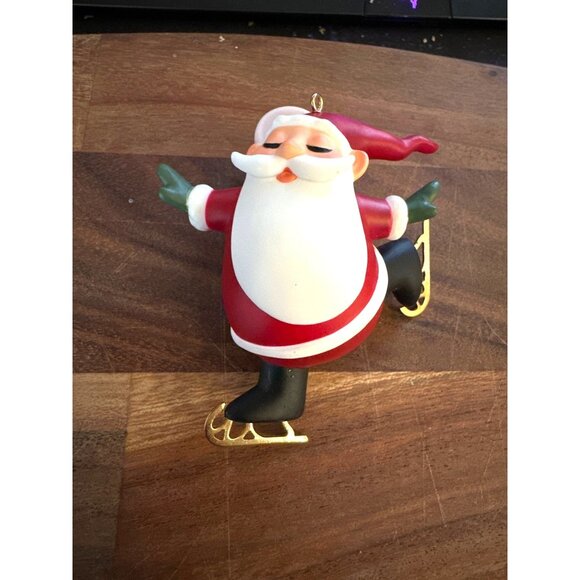 Hallmark Skating Santa Keepsake Ornament Figure Ice Skating 2013 Christmas Decor - Picture 1 of 5